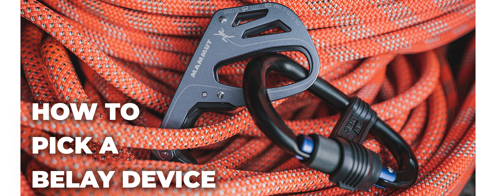 Banner image displaying Mammut belay device in coil of rope